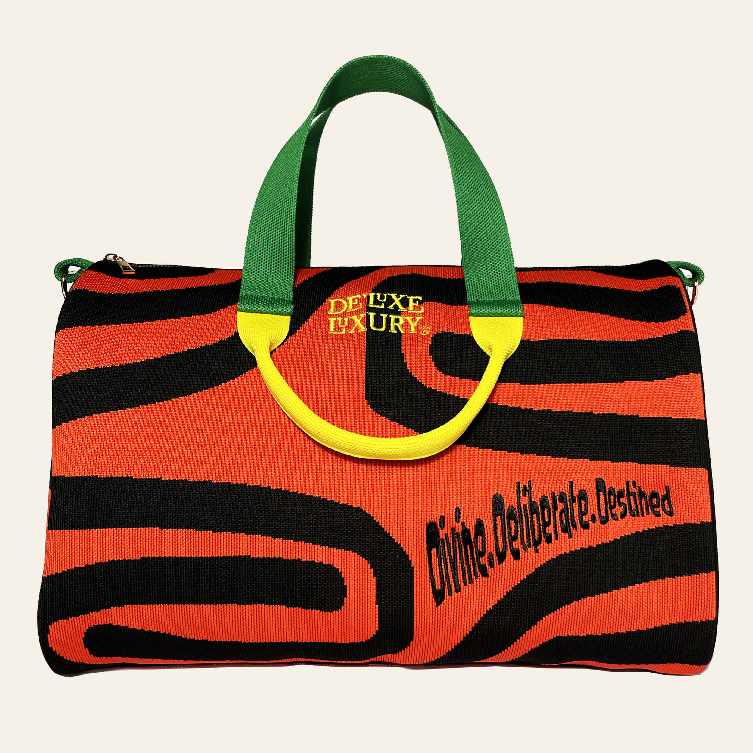 De'Luxe Luxury Scarab Journey handbag  front view in emerald, citrine, black and amber knit fabric