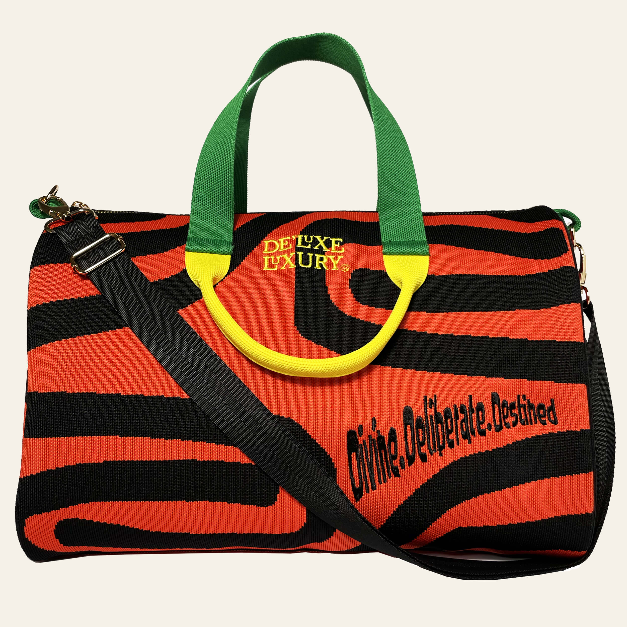 De'Luxe Luxury Scarab Journey handbag  front view in emerald, citrine, black and amber knit fabric
