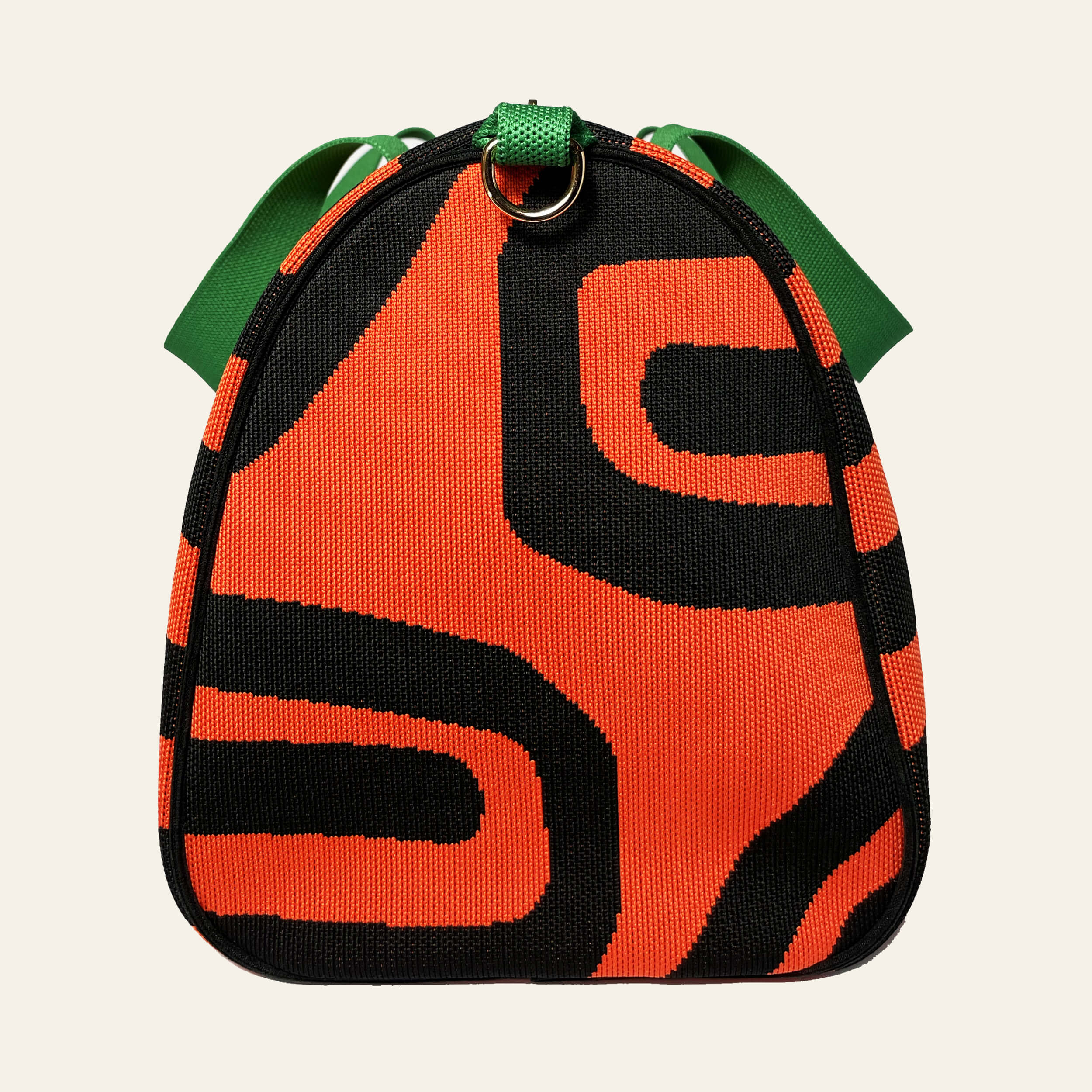 De'Luxe Luxury Scarab Journey handbag  side view in emerald, citrine, black and amber knit fabric