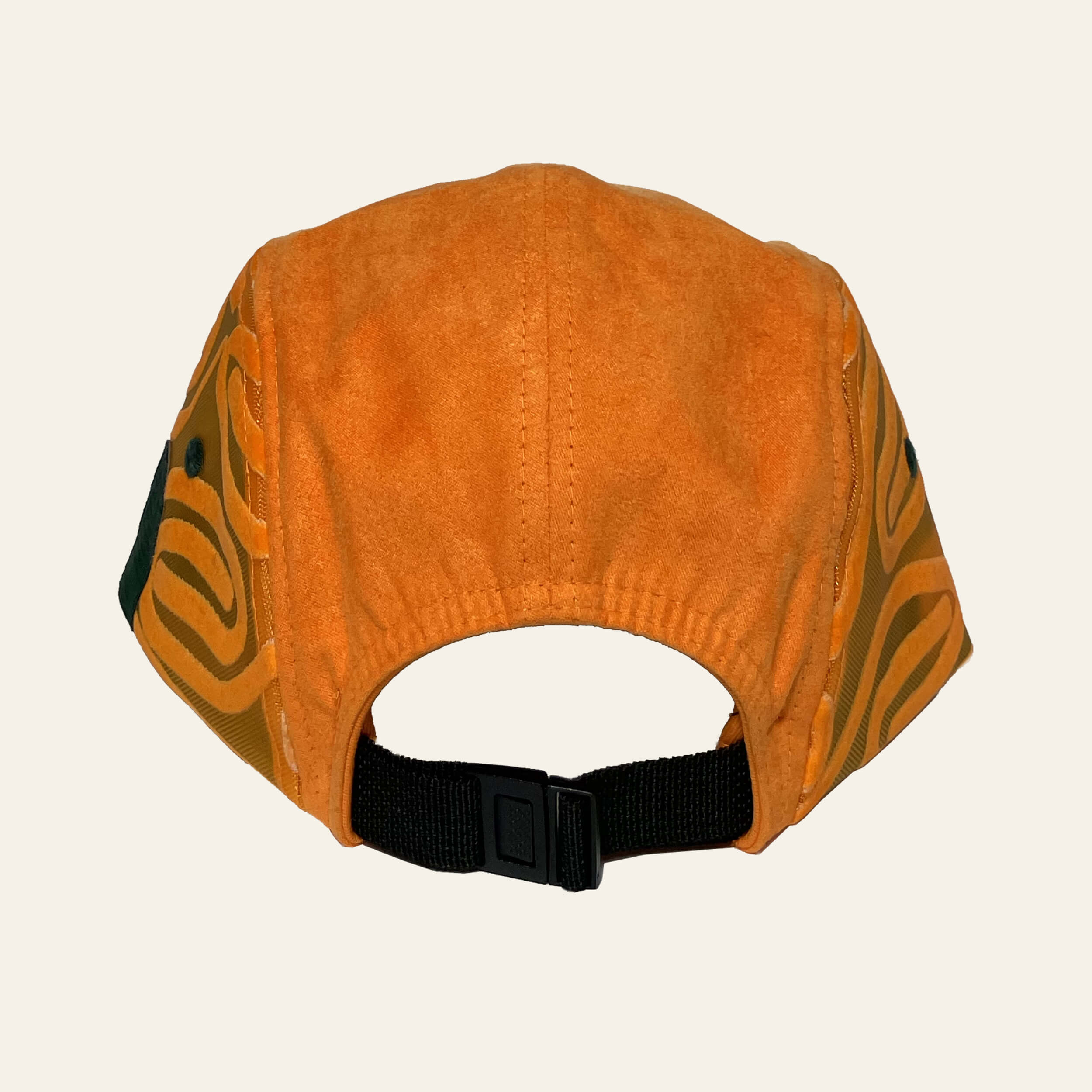 De'Luxe Luxury Maverick 5 panel camper hat side view in light amber suede like material with mesh sides and detailed pattern overlay.  The back has an adjustable strap in black