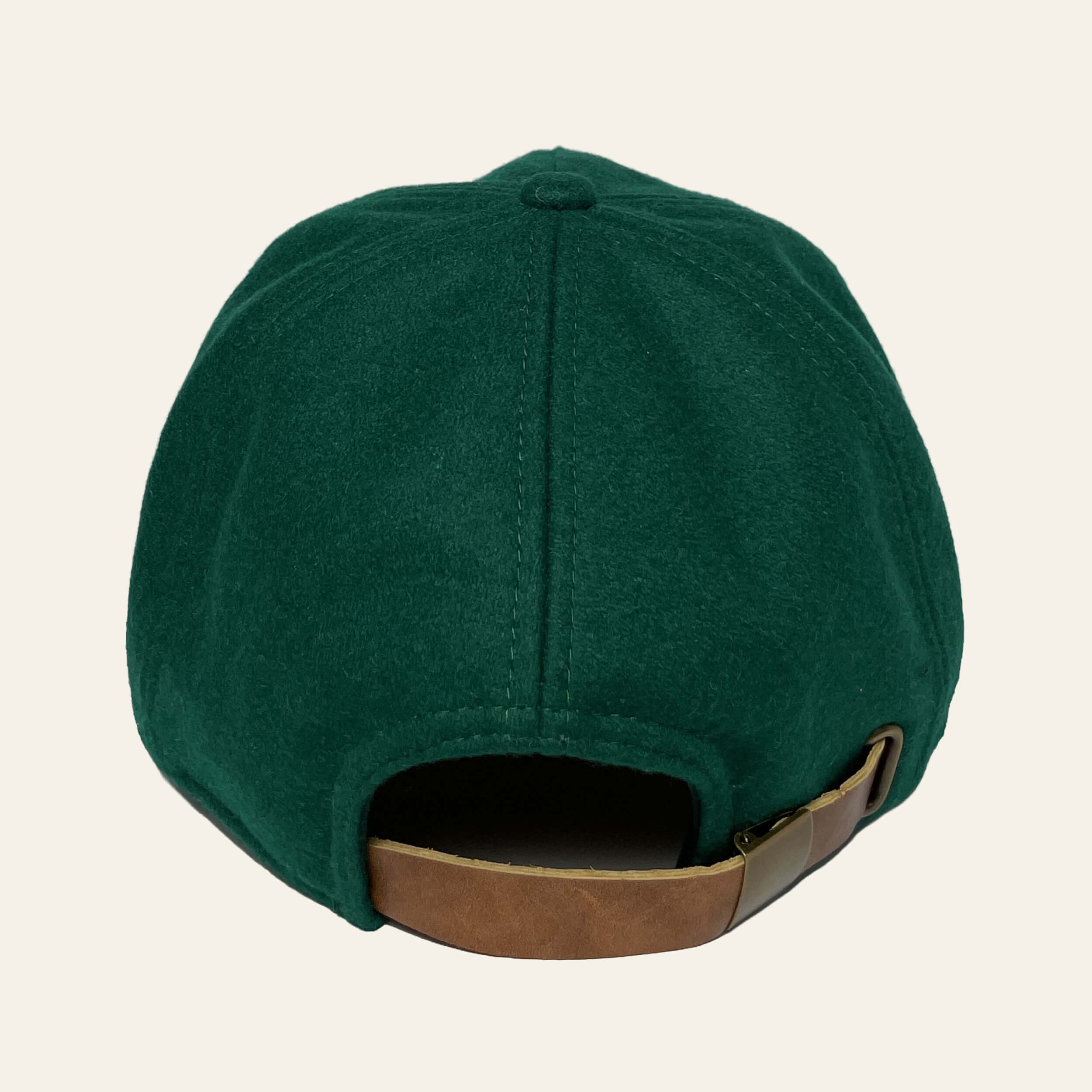 De'Luxe Luxury Origins wool blend hat  back side view in emerald with leather like strap and brass buckle